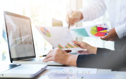 Young startups business meeting to discuss the situation on the marketing in the meeting room. Business teamwork meeting concept.